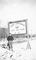 Enrollee Bob Lee at entrance to Camp Copperhead.