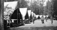 Camp Morgan tents. The first, but temporary
                  quarters.