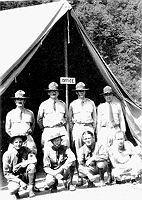 Officers and enlisted, army leaders of Camp Wyoming. Standing, L to R are Captain Charles May, Lt C. Barrien, Captain J. West and the camp surgeon, Lt L. Zwick, MD. Kneeling/sitting, L to R are SSgt N. Capps, Sgt A. Gardner, Sgt E. Wiggins and Pvt E. Yonkowski, cook (Source: NACCCA and "Written on the Land")