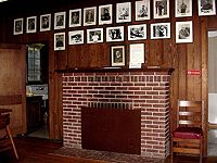 Interior of the "bunkhouse" at Camp Parsons.  Notice that the interior is paneled with chestnut.  This wood was plentiful before the blight in the 1930s and 1940s that killed most of the trees.